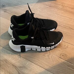 Nike Women’s Black and White Flex Sneakers